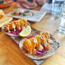 Loló signature dishes Fish Tacos‘Al Pastor’ Cauliflower TacosHouse Empanadas